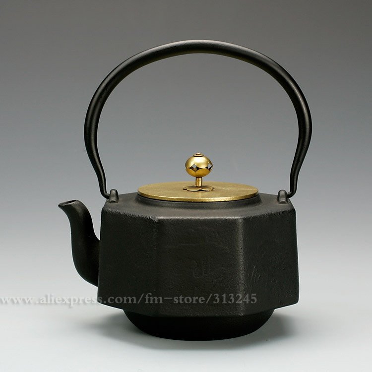 Black With A Handle Iron Tea Pot