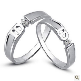 Silver With Characters On A Couple Wedding & Engagement Rings
