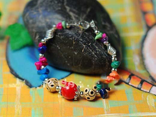 Round Shape Alloy Coral Tibetan With Many Small Beads Bracelet