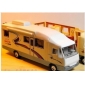 White Bus Shape With Many Furniture In Toy Vehicle